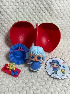 L.O.L. Surprise! Blueberry Muffin Doll with Blue Outfit & Yellow Pet
